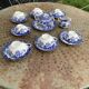Coffee service composed of 17 pieces, in blue and white porcelain, cherry blossom patterns