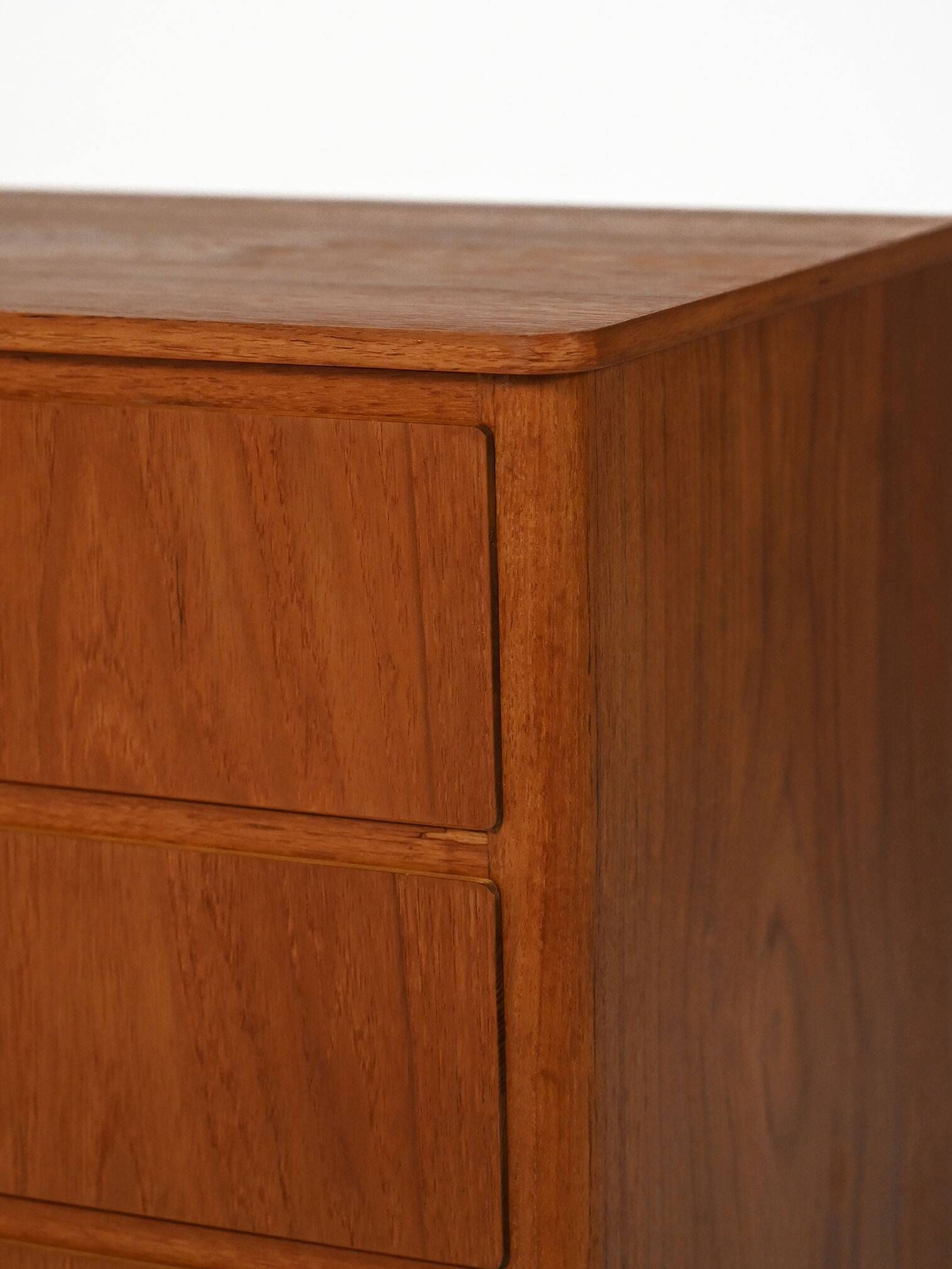 Scandinavian Chest of Drawers in teak with turned birch legs, 1950s