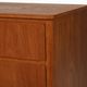 Scandinavian Chest of Drawers in teak with turned birch legs, 1950s