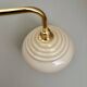 Vintage angled wall lamp with pale yellow opaline shade