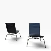 Set of 2 Crossed Legged lounge chairs by Fabiaan van Severen.