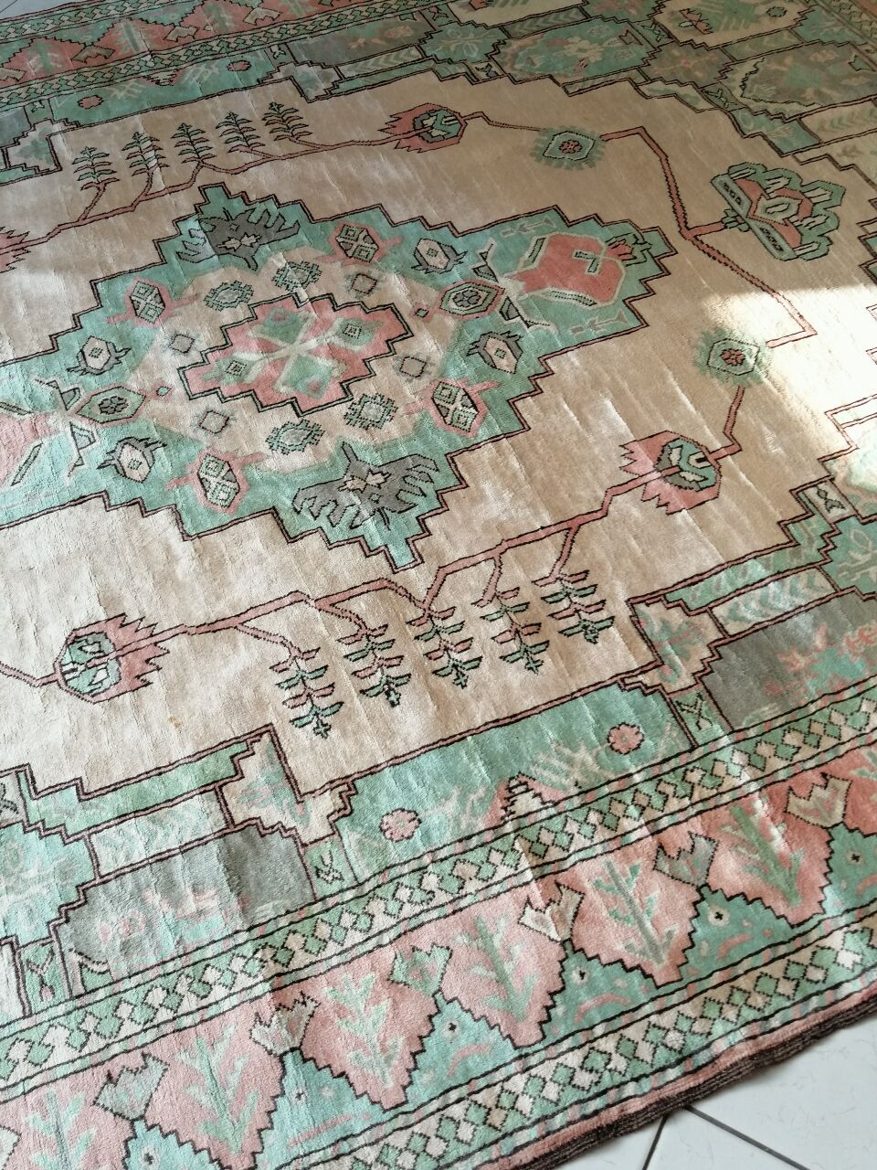 Afghan rug in pastel colors