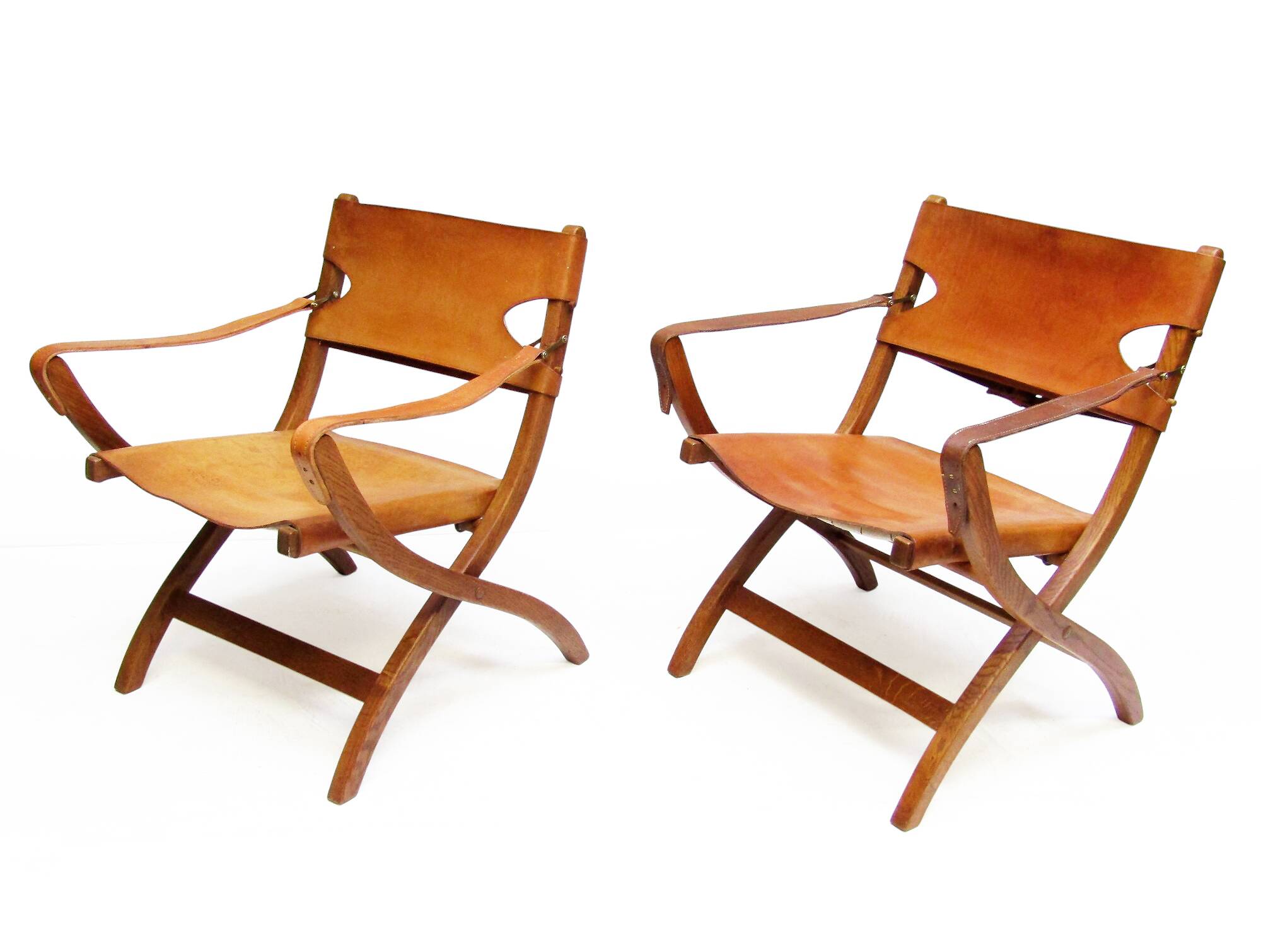 Two 1950s Danish Safari Chairs In Oak & Hide Leather by Poul Hundevad