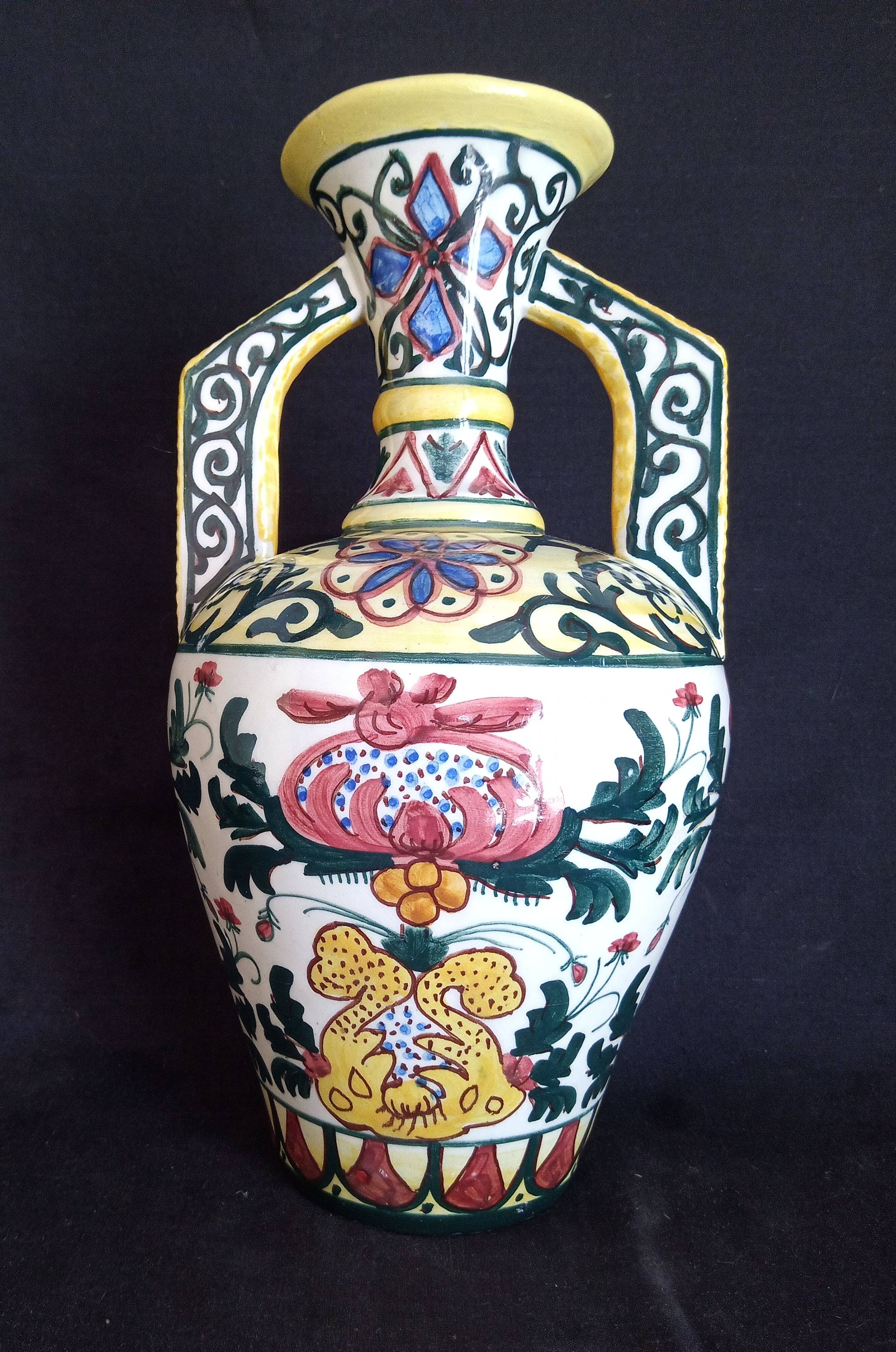 Art Deco ceramic vase with brightly colored abstract patterns