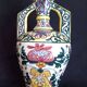 Art Deco ceramic vase with brightly colored abstract patterns
