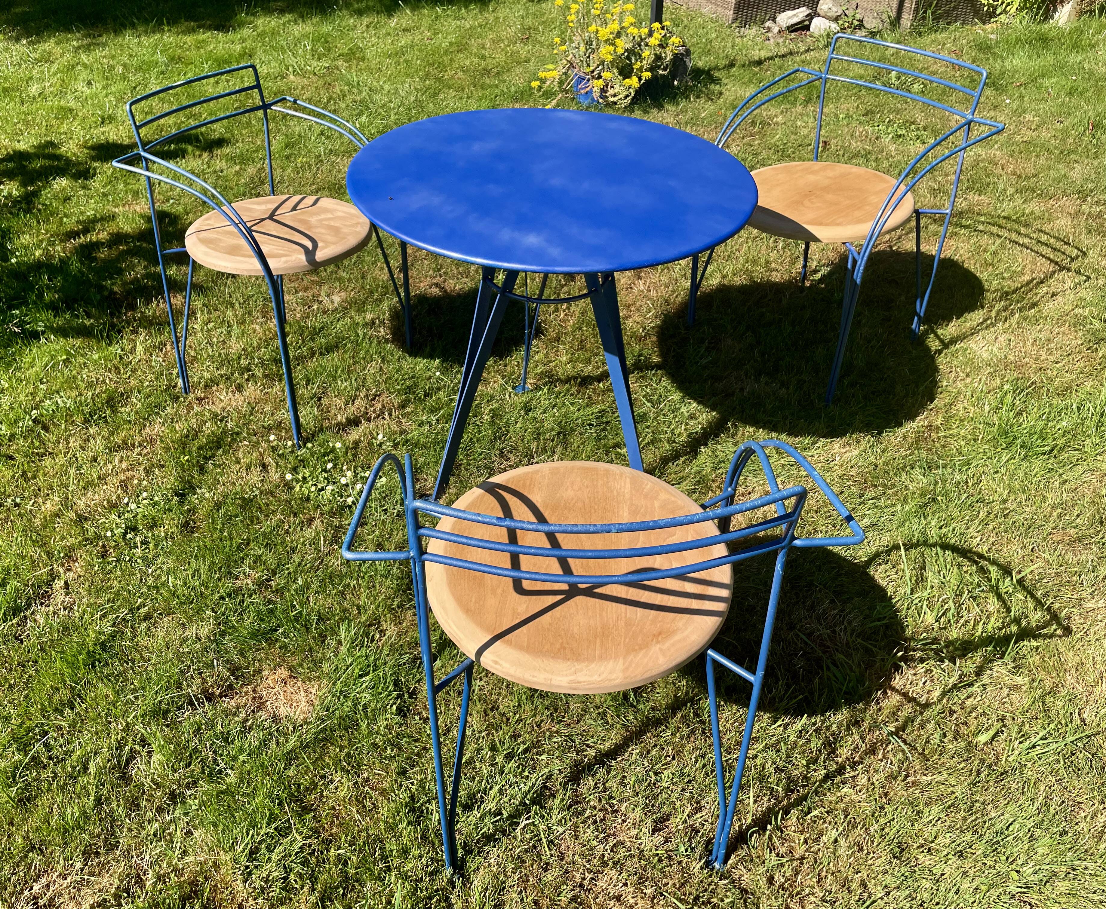 Garden furniture set by "Pascal Mourgue", a table and 3 chairs, 1980s