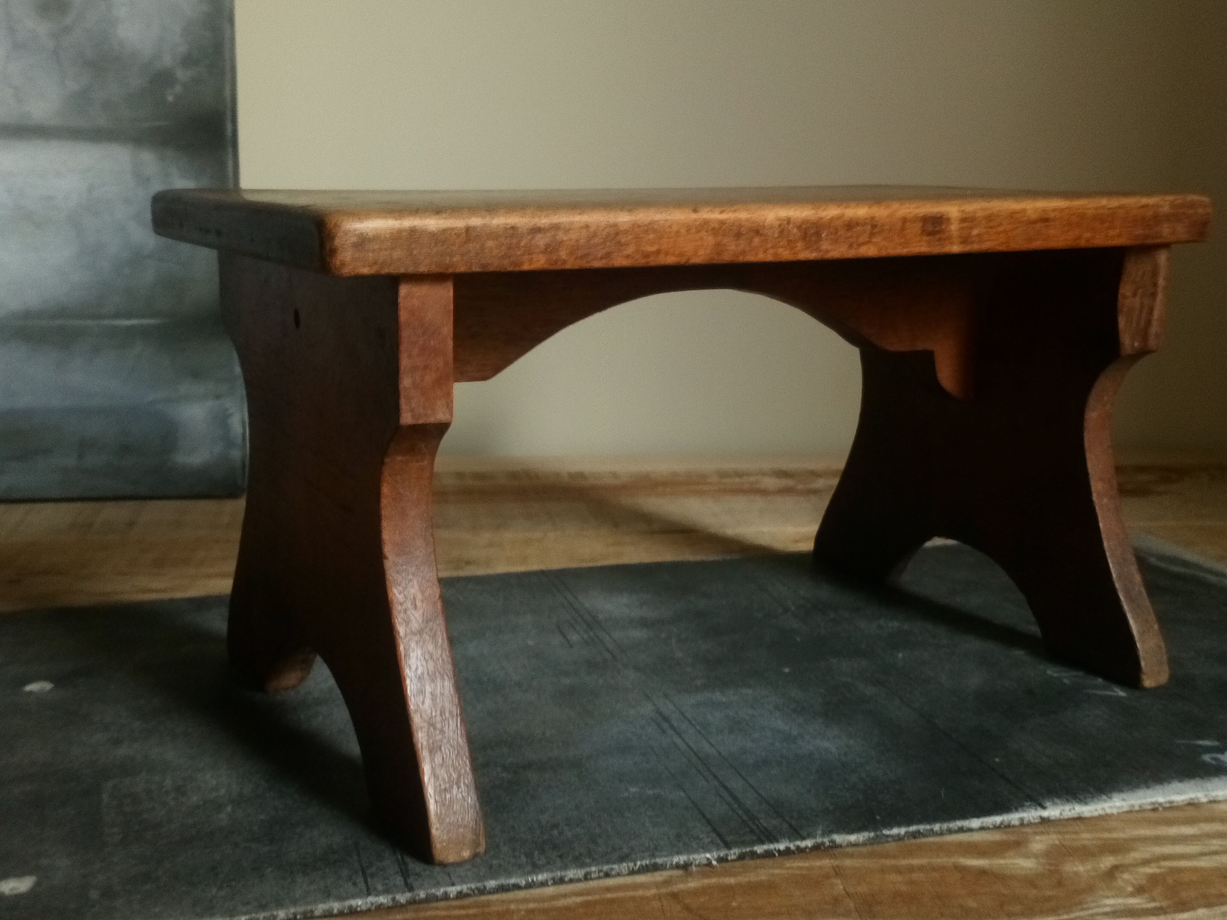 Old solid wood footring bench