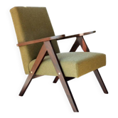 Vintage armchair moss green bouclé design by H.Lis
