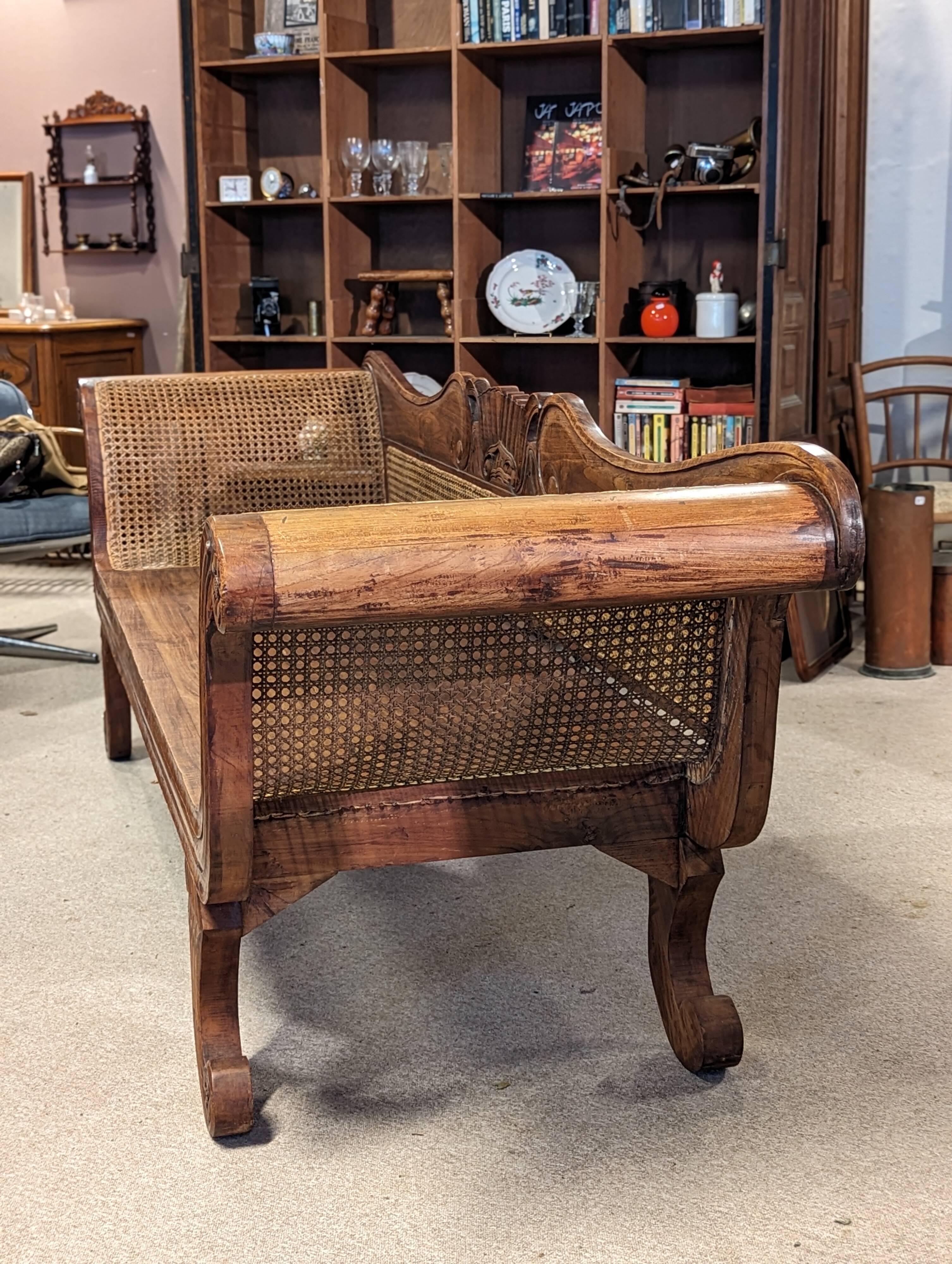 Large colonial caned bench