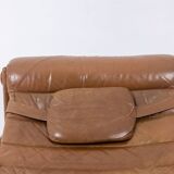 Lounge chair and ottoman, in blond elm and leather. 1970s