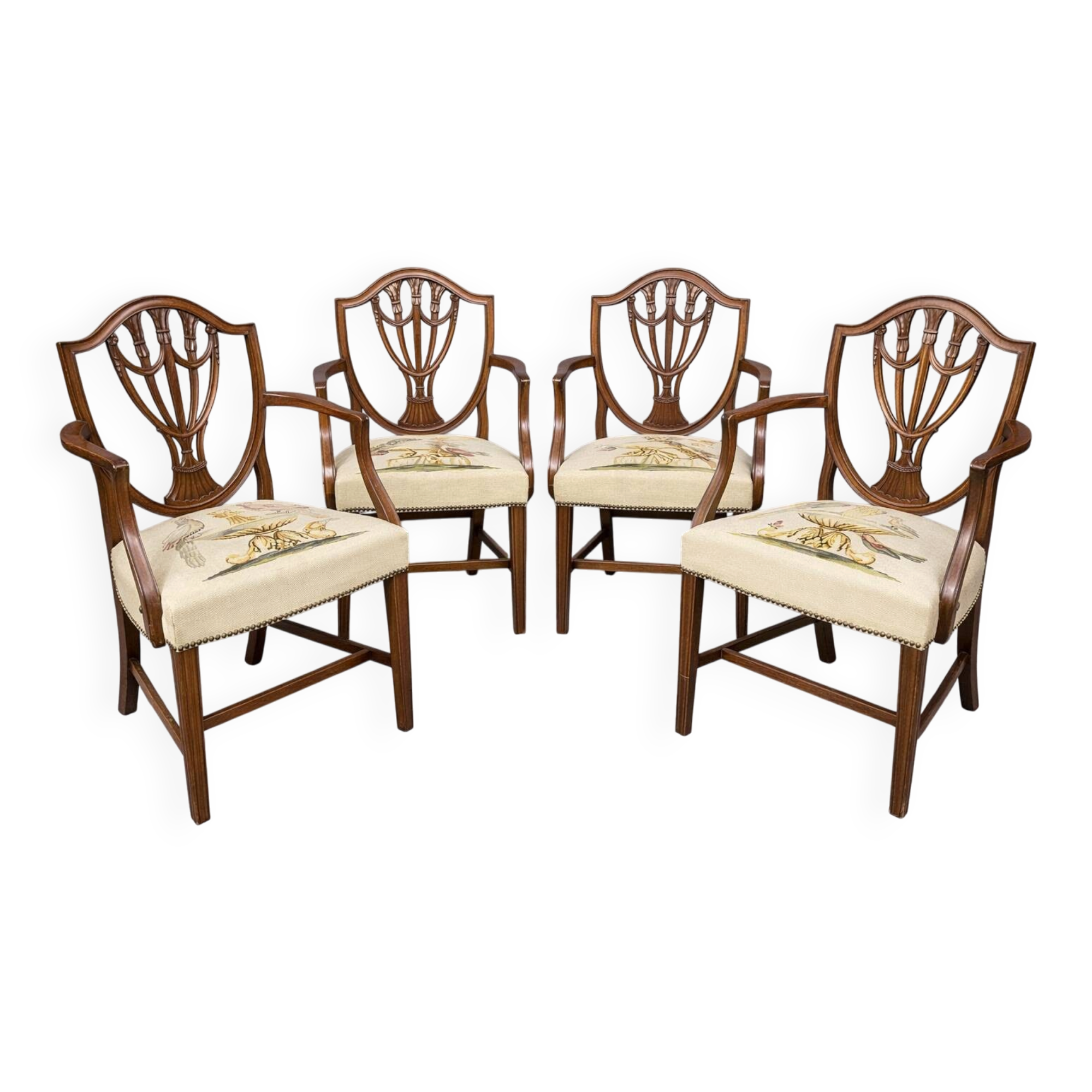 Set of four Sheraton-style armchairs. Solid walnut.