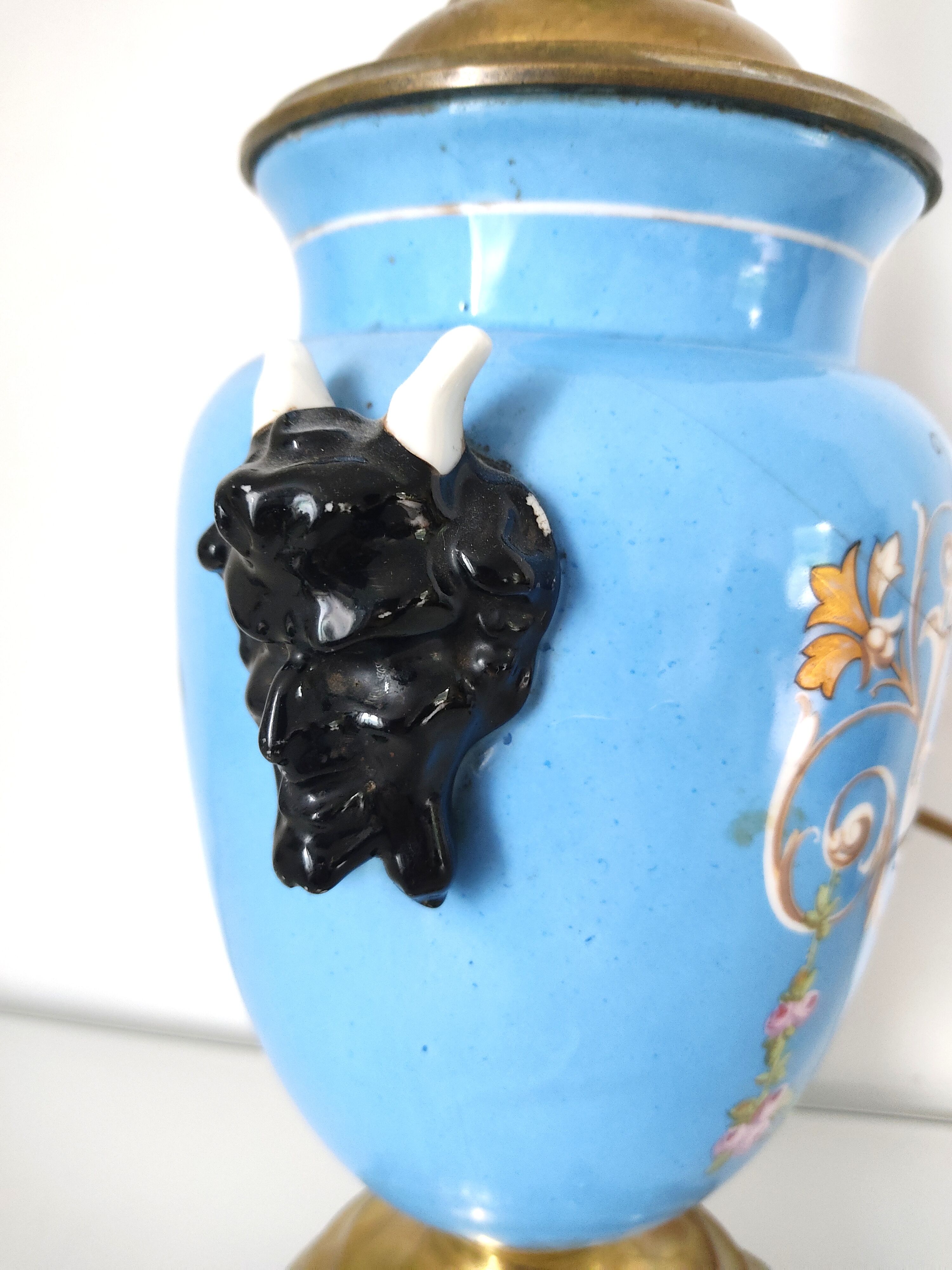 Lamp foot blue vase heads of fauna