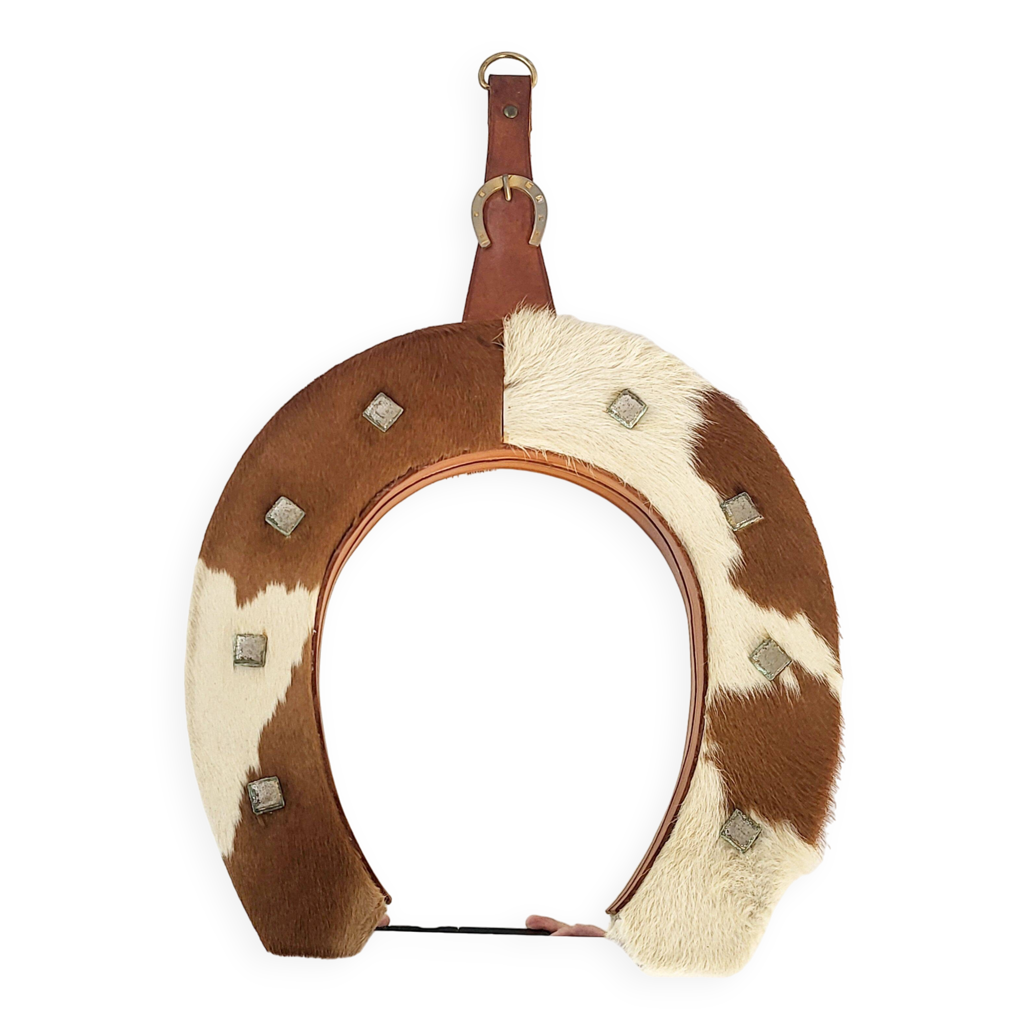 Vintage 1970s cowhide horseshoe mirror