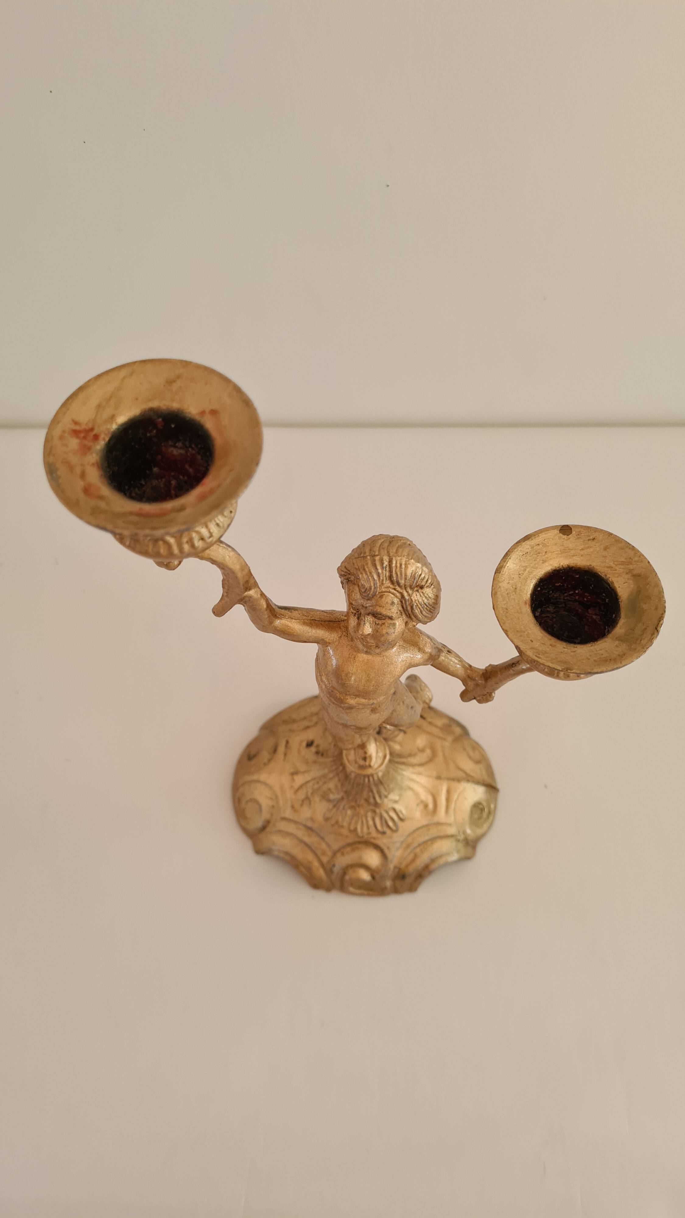 "Cherub" gilded brass candlestick