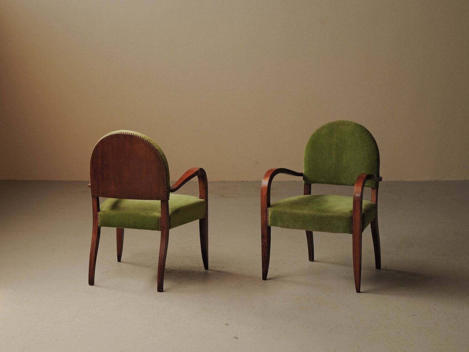 Pair of Art Deco armchairs in mahogany, circa 1930.