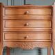Curved fruitwood chiffonnier in Louis XV style.