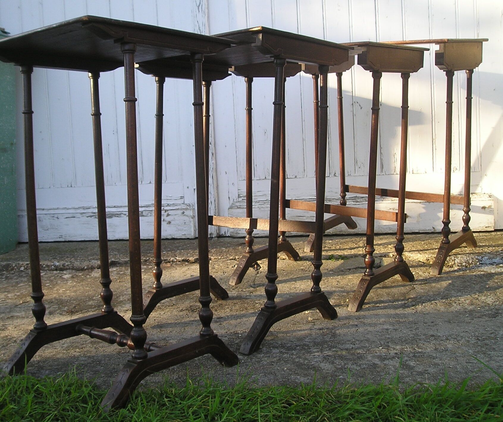 Set of 4 old tables with carved trays