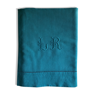 Old linen and cotton sheet tinted in green blue