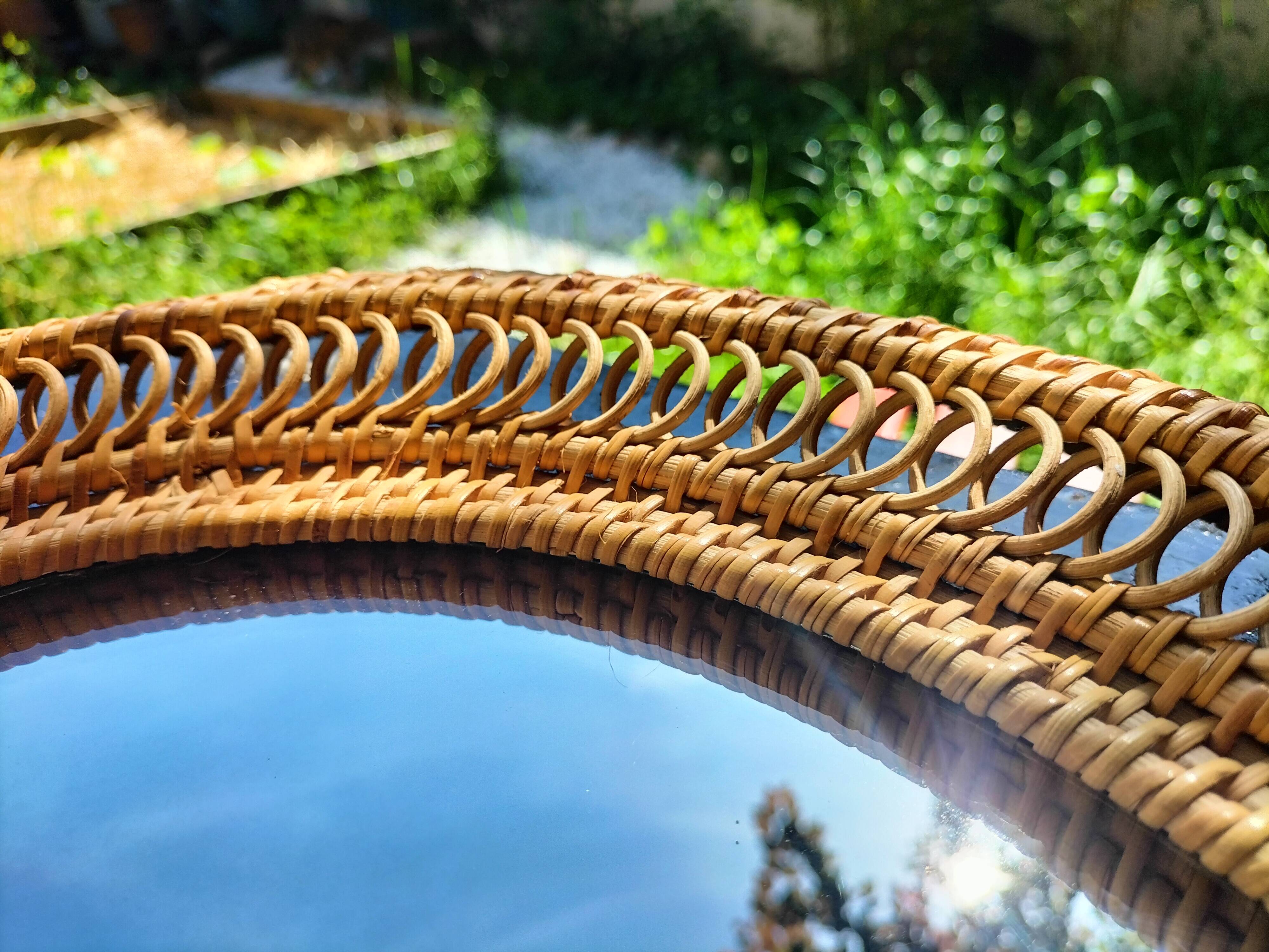 Oval rattan mirror