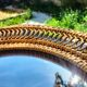 Oval rattan mirror