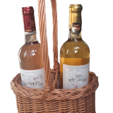 Wicker basket with two bottles of wine