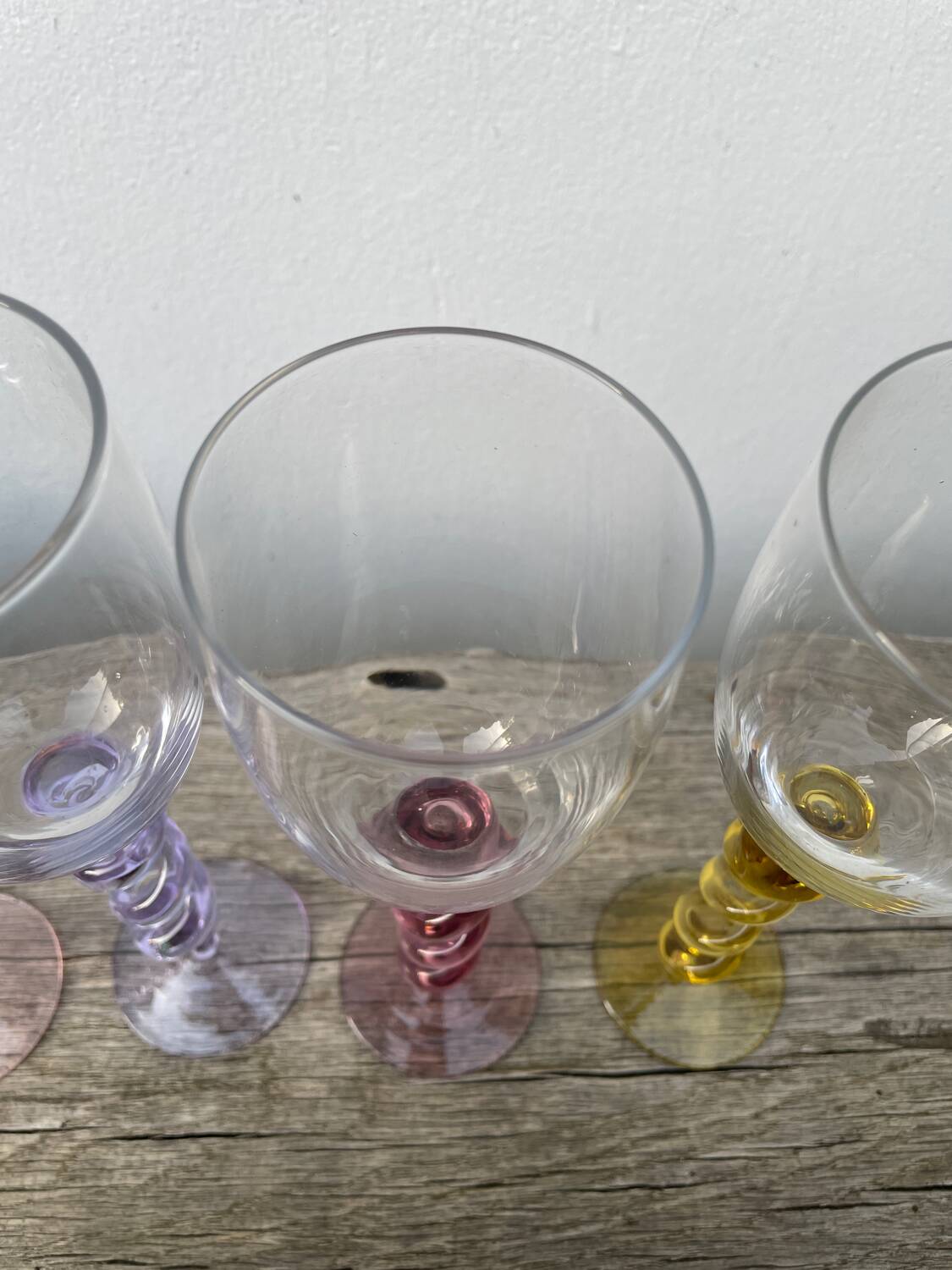 4 large, multicoloured, twisted champagne flutes