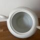 Beautiful vintage porcelain sugar bowl with a floral pattern.
