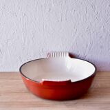 Red cast iron oven dish
