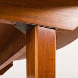 Scandinavian round teak table with hidden extension, 1970s