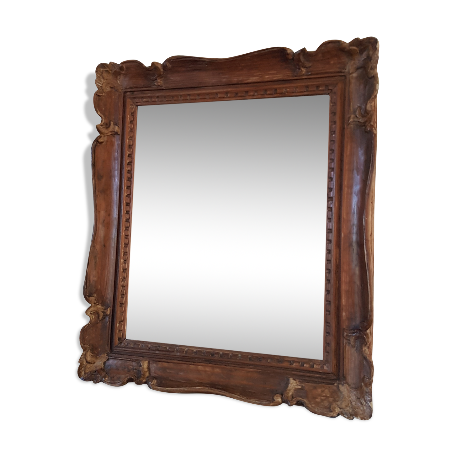 Carved wooden mirror