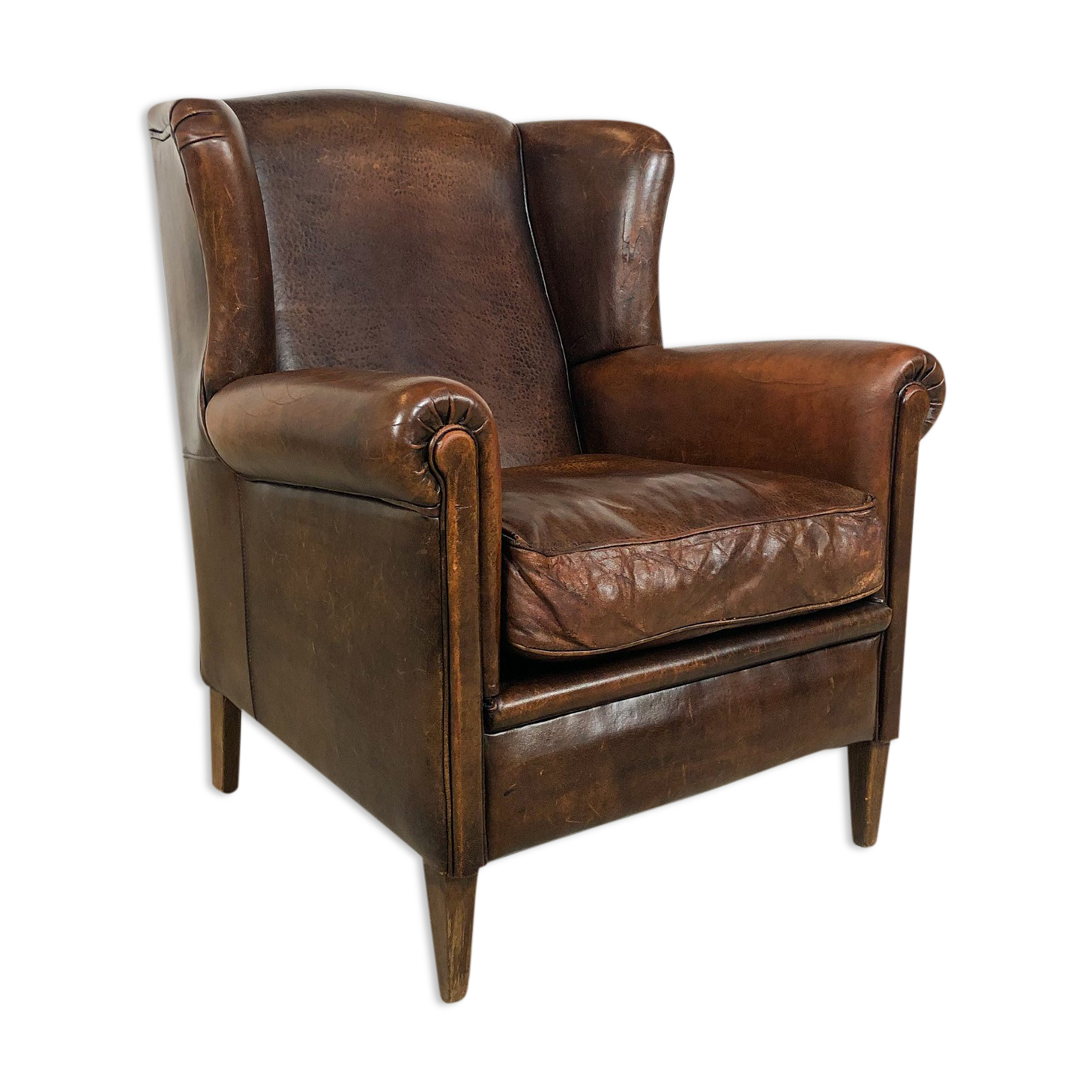 Dark brown sheep leather wingback armchair