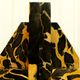 Pair of Portor marble bookends, black and golden yellow