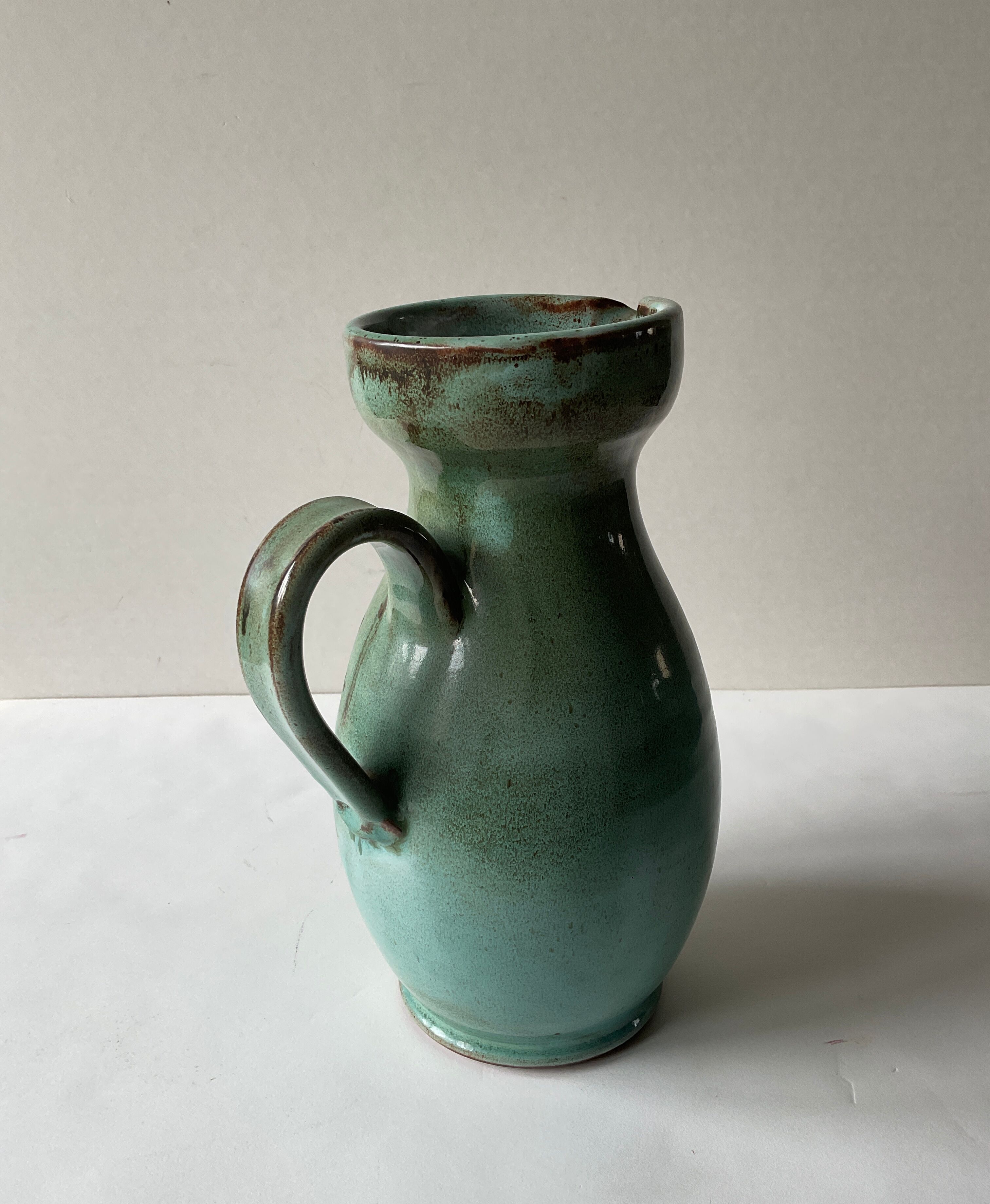 Vintage celadon ceramic pitcher