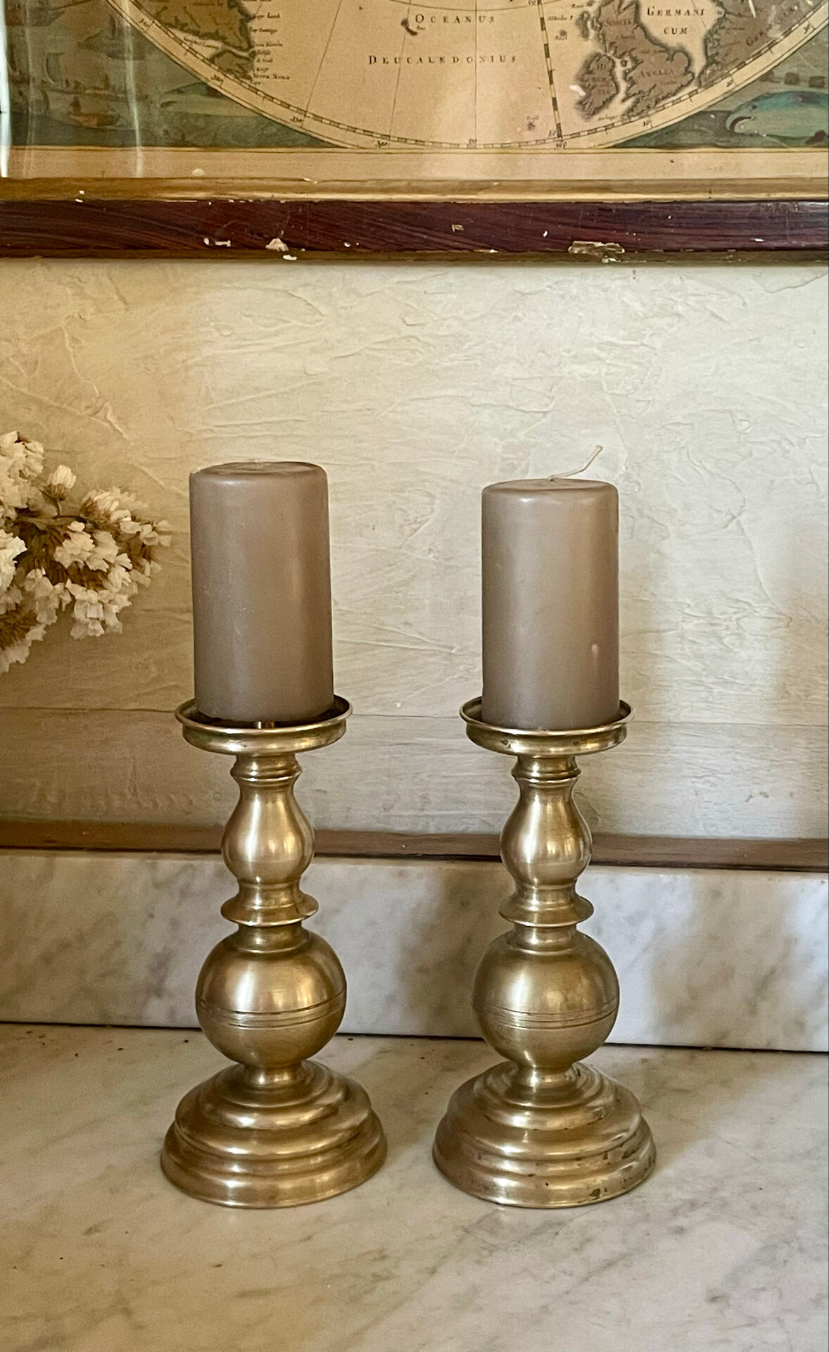 Pair of solid brass candlesticks from the 19th century.