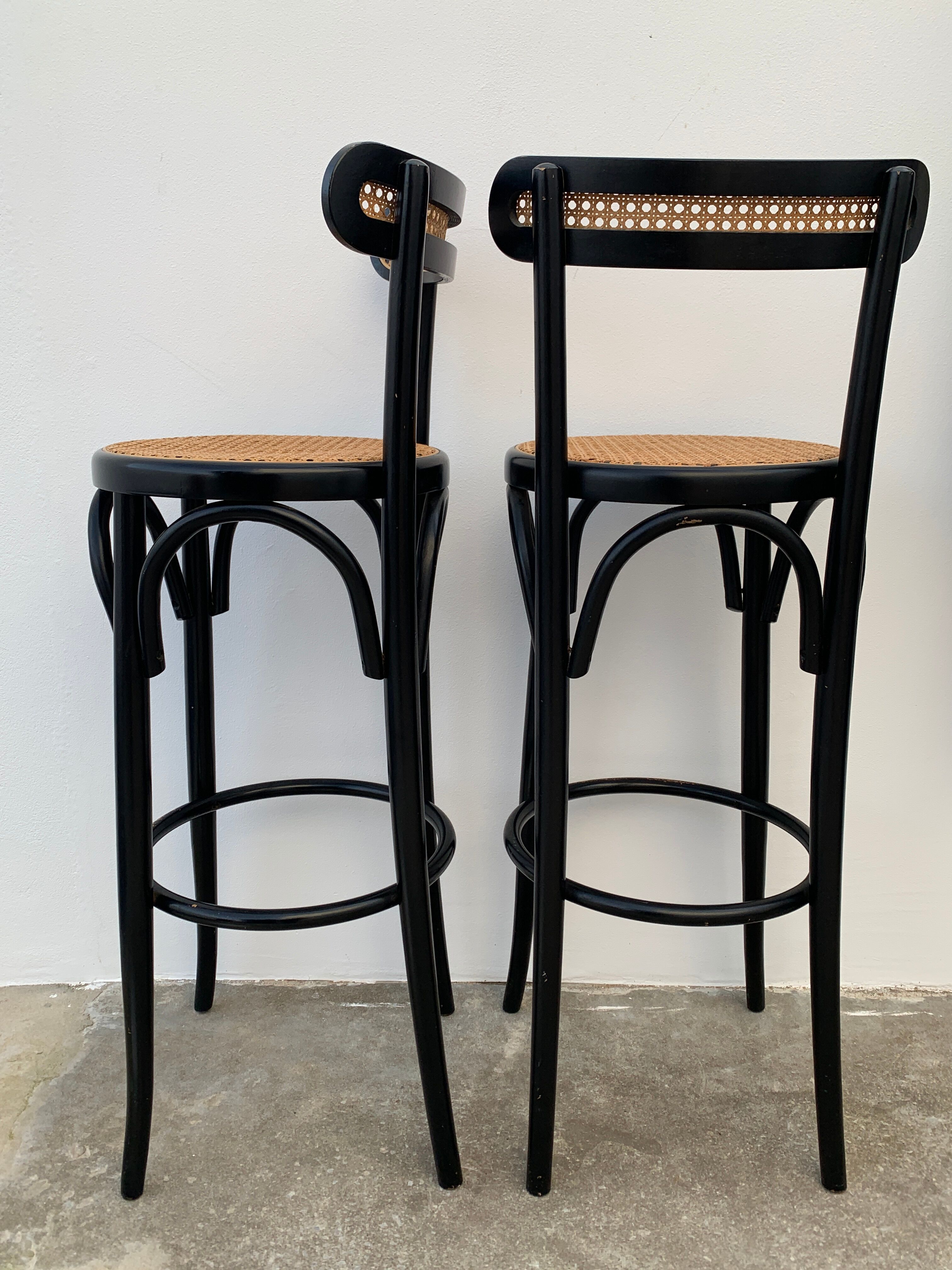 Pair of high canne stools or black curved wooden bar chairs, 1970