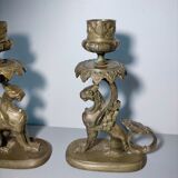 Pair of bronze hand candlesticks decorated with chimeras 19th century
