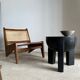 Black mango wood tripod side table with a semi-spherical top, height: 45 cm, diameter: 44 cm.