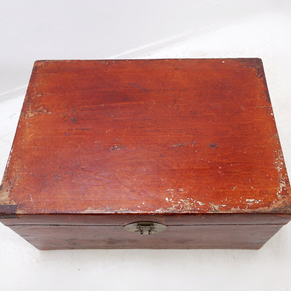 Chinese red lacquered leather trunk from the early 20th century.