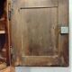 Antique wardrobe standing man