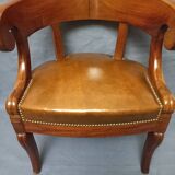 Fauteuil de bureau garni de cuir début XIXe siècle,