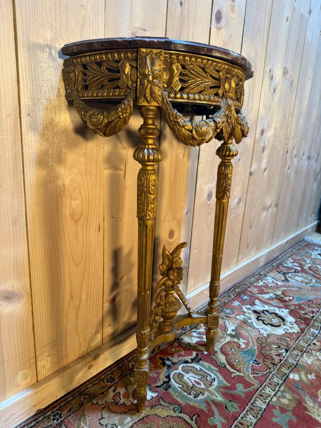 Louis XVI style console in gilded and carved wood