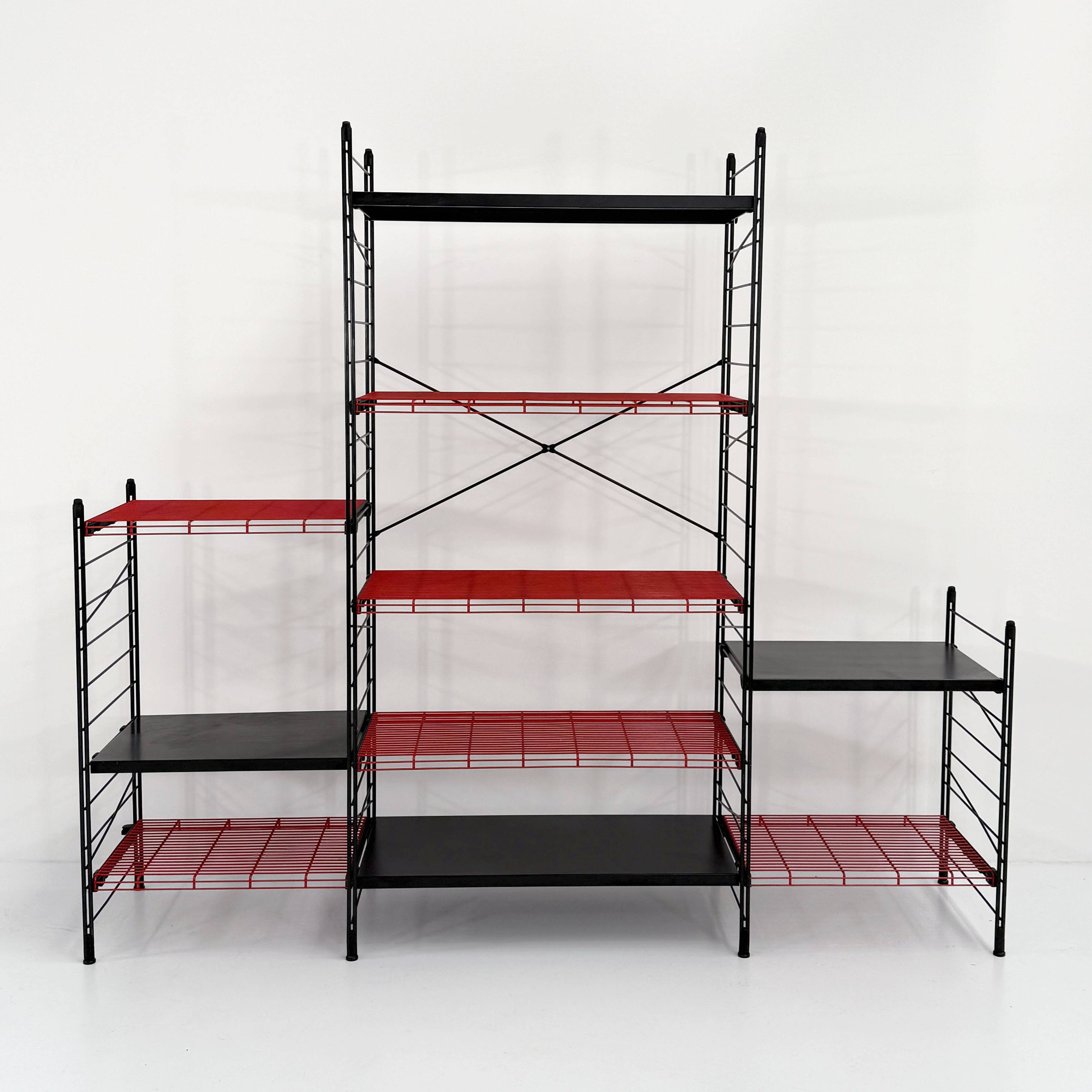 Modular, postmodern, red and black freestanding shelving unit, 1980