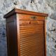 French antique wardrobe with curtain in oak, circa 1920–1930.