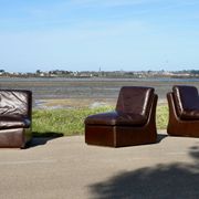 Modular sofa made up of 3 leather armchairs. Circa 1970