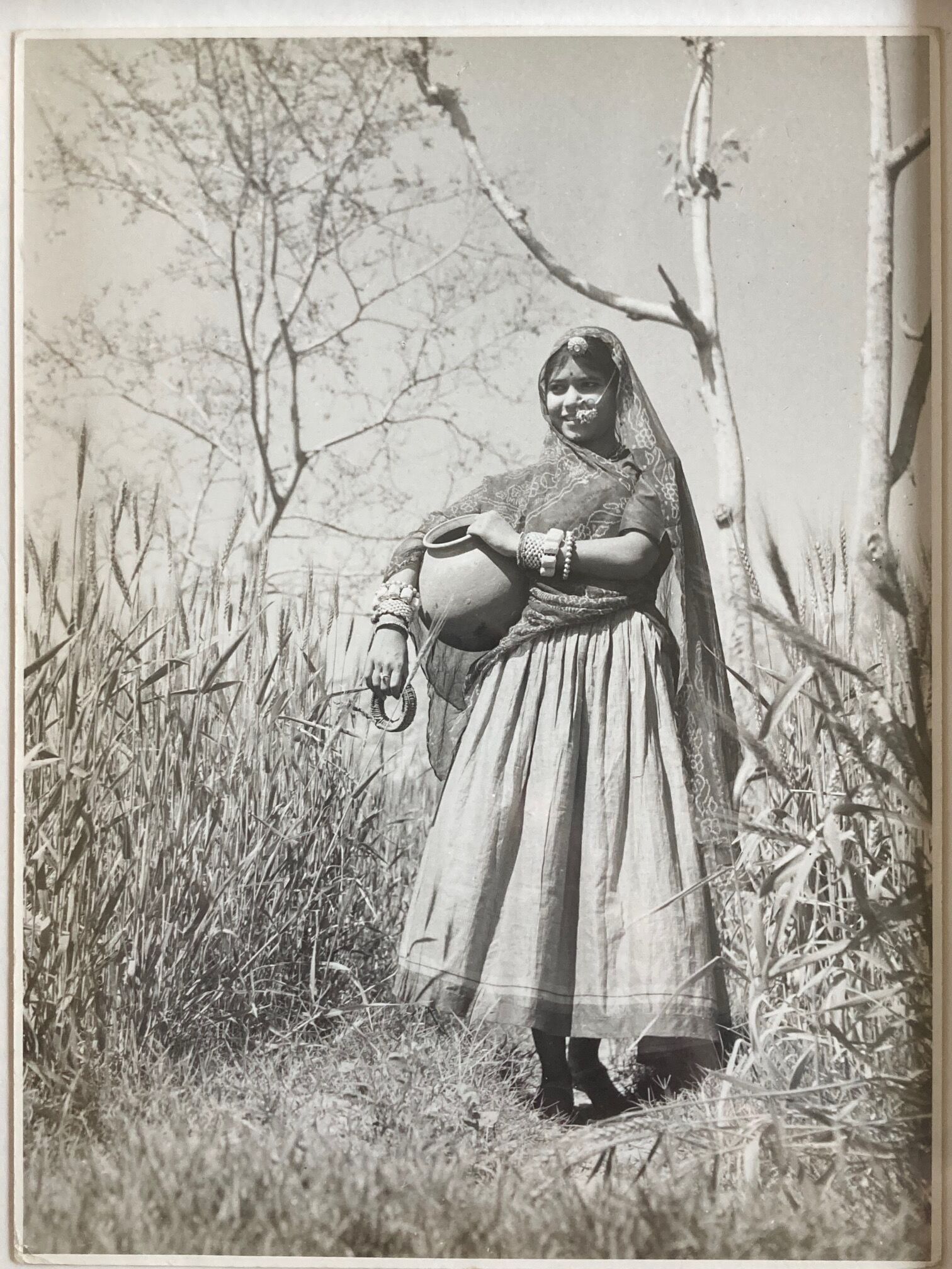 Original photograph by Suraj N. Sharma: young woman and amphora