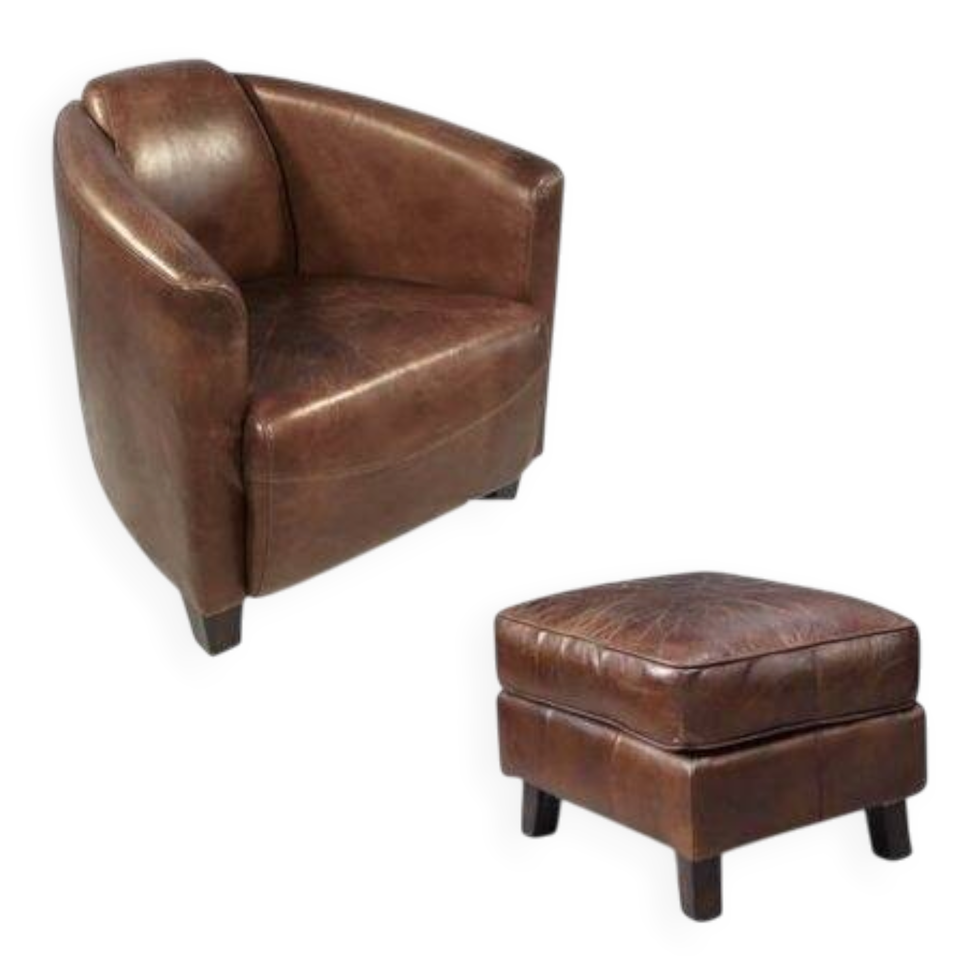 Brown leather club chair with its pouffe.