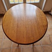 Beautiful oval wooden table with turned wooden leg with 3 extensions