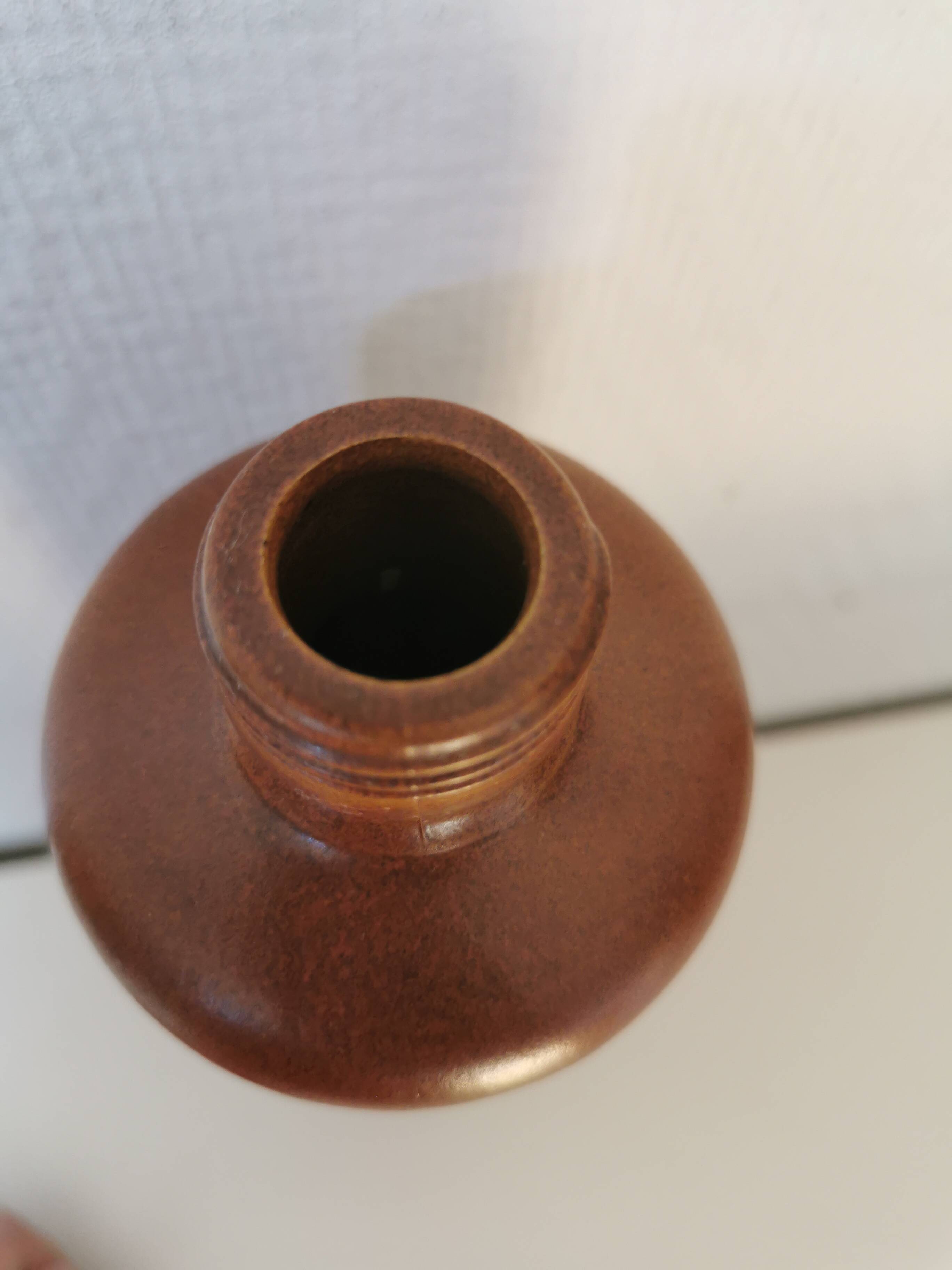 bottle, vase, soliflore in brown glazed stoneware