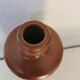 bottle, vase, soliflore in brown glazed stoneware