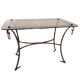 1960s/70s coffee table in wrought iron and smoked glass.